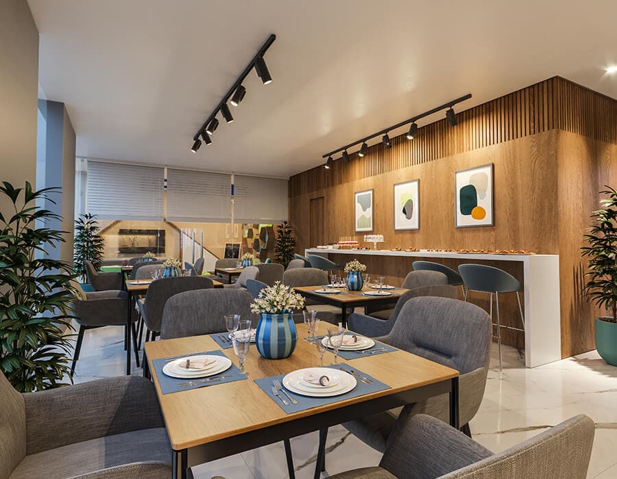 Salão de festas do Next Residence, com mesas postas e bar de apoio